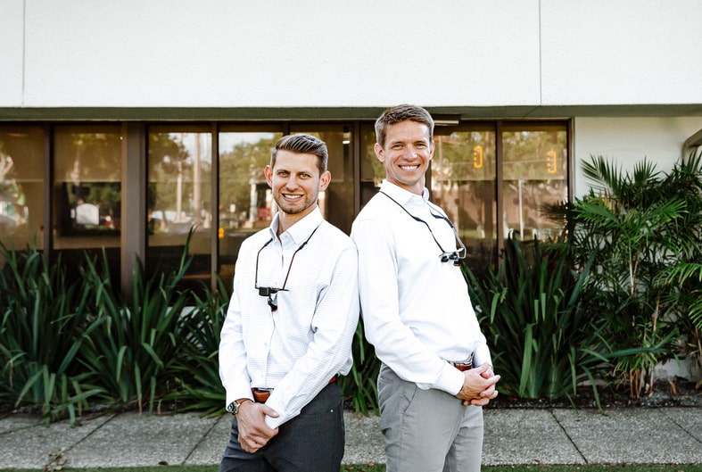 Our Dedicated Team: Your Certified Orthodontists. Certified dentists are smiling